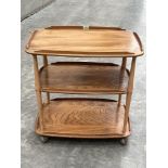 An Ercol three tier tea trolley