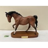 A Beswick matt glazed horse, 'Spirit of Freedom' on wooden base. 8' high