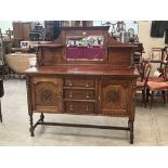 A 1930s oak mirrorback sideboard. 60' wide