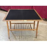 A mid-century walnut card table. Probably Danish, the baize lined fold-over top over a slatted