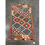 A Choli Kilim rug. 1.36m x 0.77m