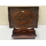 A carved oak tray 23½' wide and a 19th century mahogany cutlery tray