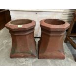 A pair of terracotta chimney pot planters. 17½' high