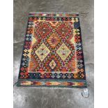 A Choli Kilim rug. 1.45m x 1.02m