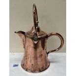 A Georgian copper pitcher with campana domed cover and swing handle. 12½' high