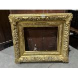 A gilt picture frame. 14' x 18' aperture size. 26' x 30' overall