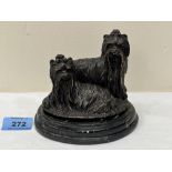A French bronze group of two Yorkshire terriers, raised on a marble base. Indistinctly signed. 4¾'