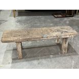 An oak pig bench. 47' long