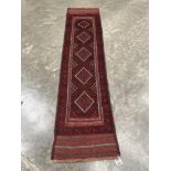 A Meshwani carpet runner. 2.58m x 0.62m