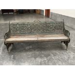 Attributed to Coalbrookdale. A Victorian cast iron 'Passion Flower' bench with wood slatted seat,