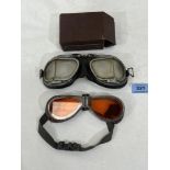 Two pairs of motoring goggles