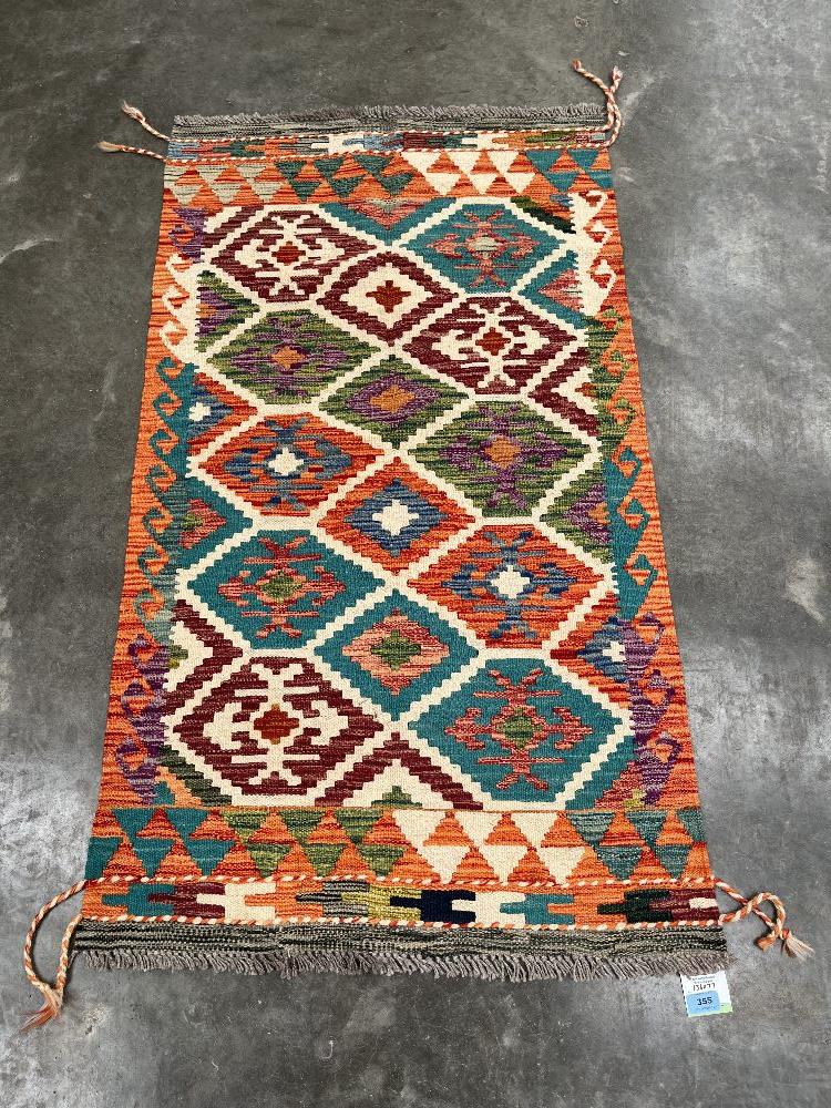 A Choli Kilim rug. 1.36m x 0.77m