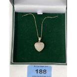 A 9ct diamond set heart pendant and necklet chain