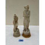 Two marble neo-classical figures after the antiques raised on socle bases. The larger 11' high.