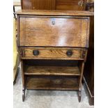 An early 20th century Arts and Crafts style oak student's bureau. 30' wide