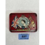 A royal coronation Elizabeth II enamel tin. 3¾' wide