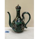 A late 19th century oriental globular teapot with cover and scrolled serpent handle. 10' high.