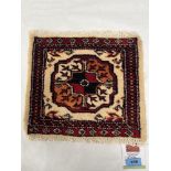 A Mori Jaldar carpet mat. 0.27m x 0.30m