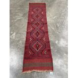 A Meshwani carpet runner. 2.47m x 0.61m