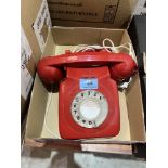 A vintage red telephone