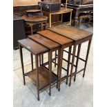 An Edward VII mahogany, line inlaid and banded set of quartetto tables on square tapered legs with