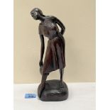 A carved wood female figure, the base signed Louis Desire, Domenica. 12' high