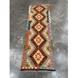 A Choli Kilim carpet runner. 2.07m x 0.67m