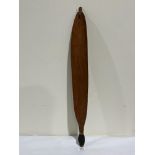 An Aboriginal West Australian paddle form spear thrower 'Meru' (?). 28' long x 3¼' wide (max)