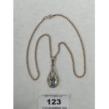 A 9ct openwork gem set pendant on 9ct necklet chain. 7g gross