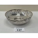 An Edward VII silver reticulated bowl. London 1909. 4½' diam. 2ozs 12dwts