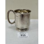 A George V silver christening mug. Engraved initials. Sheffield 1933. 3' high. 3ozs 8dwts