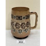 A Doulton Lambeth mug, with sprigged inscription 'More Than Enough is Too Much'. 5¼' high