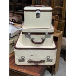 A set of three vintage cases