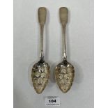 A pair of George III silver fiddle pattern berry spoons. Chester 1822. 3ozs 14dwts