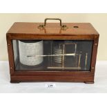 A mahogany cased barograph by Wilson, Warden & Co; gilt brass with seven aneroid pressure cells,