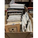 A box of auction catalogues