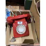 A vintage red telephone