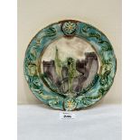 A 19th century French majolica 'Joan of Arc' plate. 8½' diam.