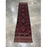 A Meshwani carpet runner. 2.41m x 0.6m