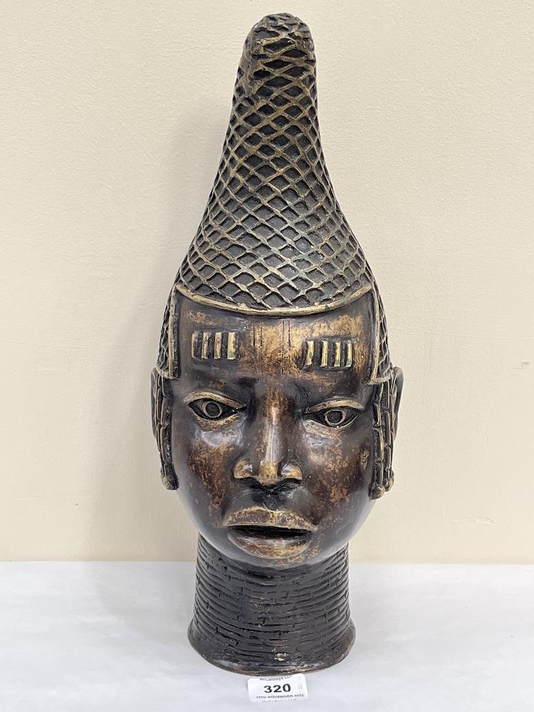 A bronze Benin head. 16¾' high