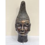 A bronze Benin head. 16¾' high