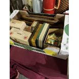 A box of vintage collection boxes, loom shuttles and tins