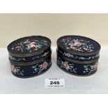 A pair of 1920s Chinese enamel decorated oval boxes with covers. 3¾' wide