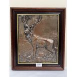 FRITZ DILLER. GERMAN 1875-1945 A relief silvered copper plaque depicting a stag in a landscape.