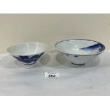 Two Chinese blue and white tapered bowls, decorated with foliage or a landscape. The larger