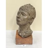 DIANA MANN. BRITISH CONTEMPORY A bronzed composition head on wood base. 14' high