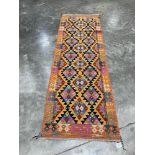 A Choli Kilim carpet runner. 2.47m x 0.83m