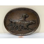 An Arts and Crafts copper relief plaque of two hounds. Signed 'VAE' 11½' wide