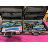 Two cases of model railway locomotives