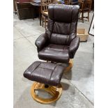 A reclining armchair with footstool